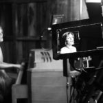 Singer songwriter Christine Rosander singing on set of the Been A Long Time music video.