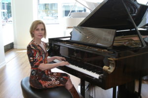 Singer songwriter Christine Rosander and The Fibonacci - Steinway & Sons 600,000th piano