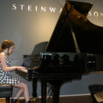 Maisie Thompson performing at Steinway & Sons Recital