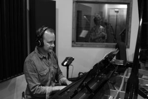 Doug Petty plays piano during the recording of the Been A Long Time album.