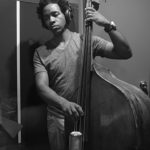 Edwin Livingston plays upright bass during the recording of the Been A Long Time album.