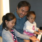 Taybi, Dad & Sister playing piano at the Steinway & Sons Recital