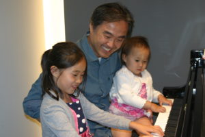 Taybi, Dad & Sister playing piano at the Steinway & Sons Recital